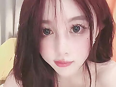 asian cutie masturbates