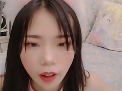 Skinny Asian Girl Playing With Toy